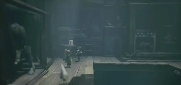 Shooting button in dark room in Little Nightmares 3 Carnival